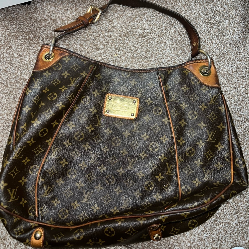 Authentic used Louis Vuitton bag.